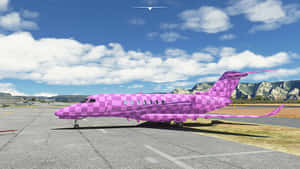 Fly Pink - A Gorgeous Plane Propelling Through The Skies Wallpaper