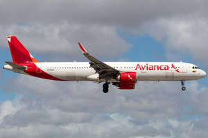 Flying Avianca Airbus A321-253n Gray Cloudy Sky Wallpaper