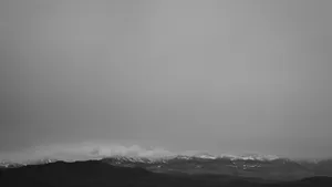 Foggy Mountain Range In Grey Desktop Wallpaper