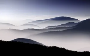 Foggy Mountainous Natural Background Wallpaper