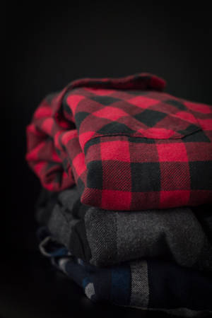 Folded Checkered Polo Shirts Wallpaper