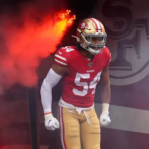 Football Intense Fred Warner Player Wallpaper