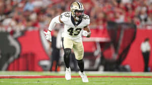 Football Player Action Shot Wallpaper