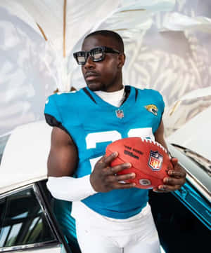 Football_ Player_with_ Sunglasses_and_ Ball Wallpaper