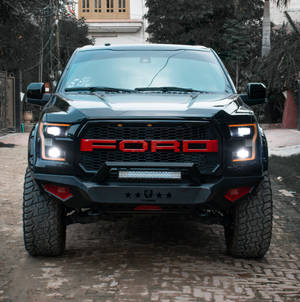 Ford Raptor In Glossy Black Color Wallpaper