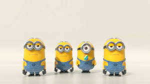 Four Serious Cute Minions Wallpaper