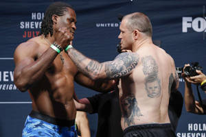 Francis Ngannou And Brock Lesnar Wallpaper