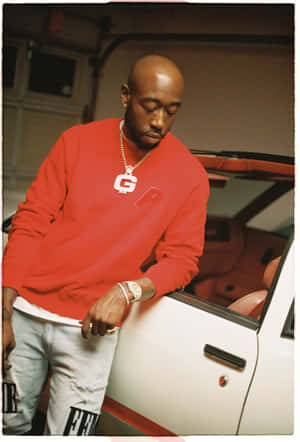 Freddie Gibbs Red Sweater Car Portrait Wallpaper