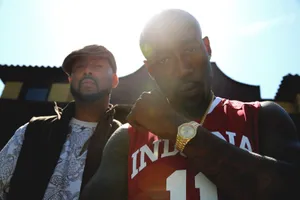 Freddie Gibbsand Friend Outdoors Wallpaper