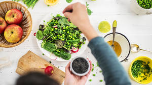 Fresh And Crunchy Leafy Green Salad Wallpaper