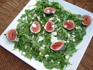 Fresh Arugula Leaves And Fig Salad Wallpaper