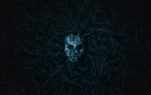 Friday The 13th Mask In Grass Wallpaper
