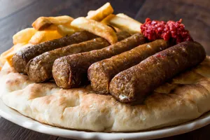 Fried Ćevapi With Fries Wallpaper