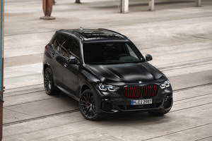 Front Shot Of Black Bmw X6 Wallpaper