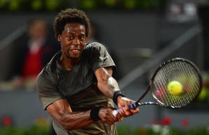 Gael Monfils Hitting Tennis Ball Wallpaper