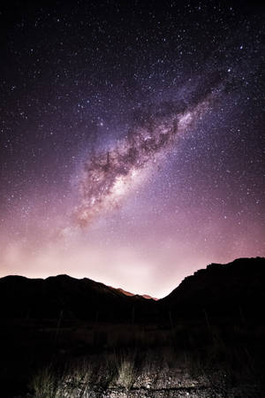 Galaxy Sky Over Mountain Dark Purple Iphone Wallpaper