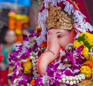 Ganpati Bappa And Flowers Wallpaper