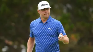 Gary Woodland Holds Golf Ball Wallpaper