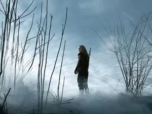 Geralt Gallivanting Through The Misty Mountains Wallpaper