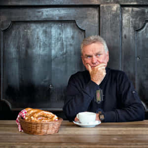 German Former Professional Football Goalkeeper Sepp Maier Hand On Chin Wallpaper