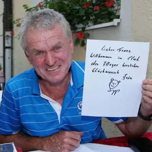 German Former Professional Football Goalkeeper Sepp Maier Holding A Note Wallpaper