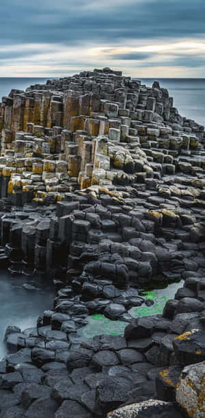 Giant's Causeway Dark Hazy Clouds Wallpaper