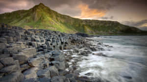 Giant's Causeway Rocks And Mountain Wallpaper