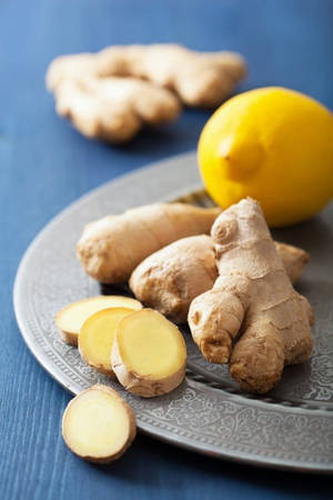 Ginger Roots Sliced And Lemon Wallpaper