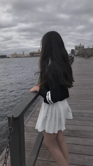 Girl Aesthetic At Boat Dock Wallpaper