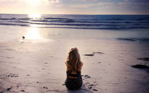 Girl Alone On The Beach Wallpaper