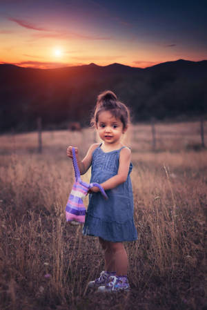 Girl Child With A Tote Bag Wallpaper