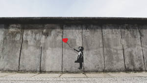 Girl Playing Heart Balloon Wall Artwork Wallpaper