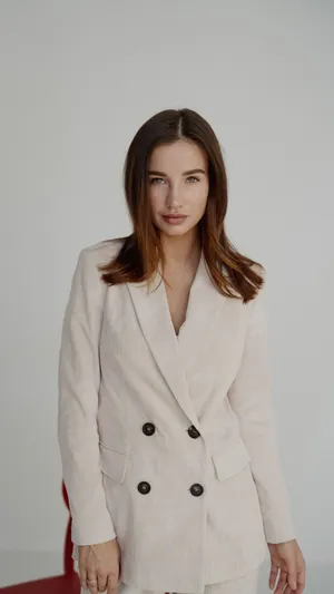 Girl Wearing Elegant Suit Wallpaper