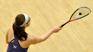 Girl With Headband Playing Squash Wallpaper