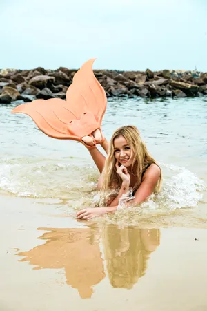 Girl With Mermaid Flippers Wallpaper