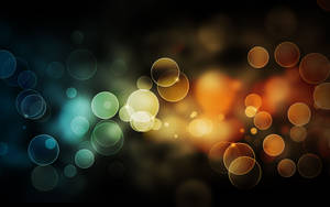 Gleaming Orange Circle Lights Wallpaper