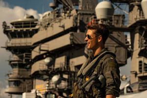 Glen Powell In Character At Top Gun Maverick Wallpaper