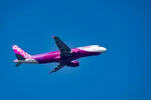 Gliding Peach Aviation Plane Wallpaper