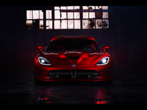 Glossy Red Dodge Viper Warehouse Wallpaper