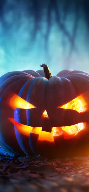 Glowing Halloween Pumpkin Night Scene Wallpaper