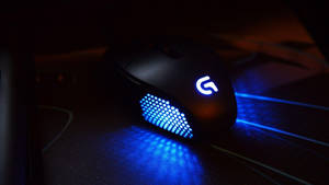 Glowing Logitech Mouse Wallpaper