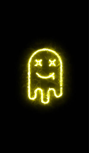Glowing Yellow Ghost Led Light Against A Dark Background Wallpaper