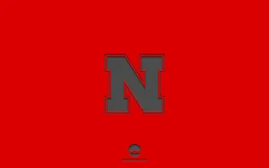 Go Big Red! Nebraska Huskers On The Road To Victory Wallpaper