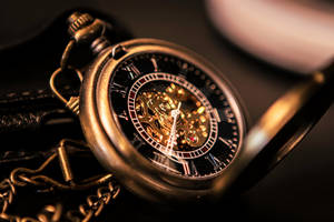 Gold And Silver Round Chronograph Watch Wallpaper