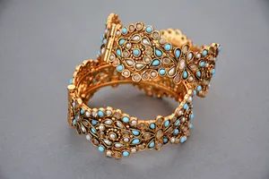 Gold Jewellery With Blue Stones Wallpaper