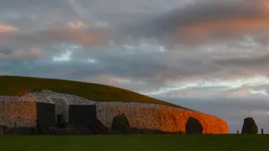 Golden Hours Newgrange With Clouds Wallpaper