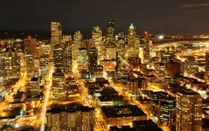 Golden Lights Of Seattle At Night Wallpaper