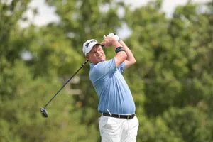 Golfer Swing Action Shot Wallpaper