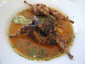 Gourmet Spice-rubbed Quail With Special Sauce Wallpaper