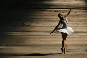 Graceful Ballerina In Perfect Form Wallpaper